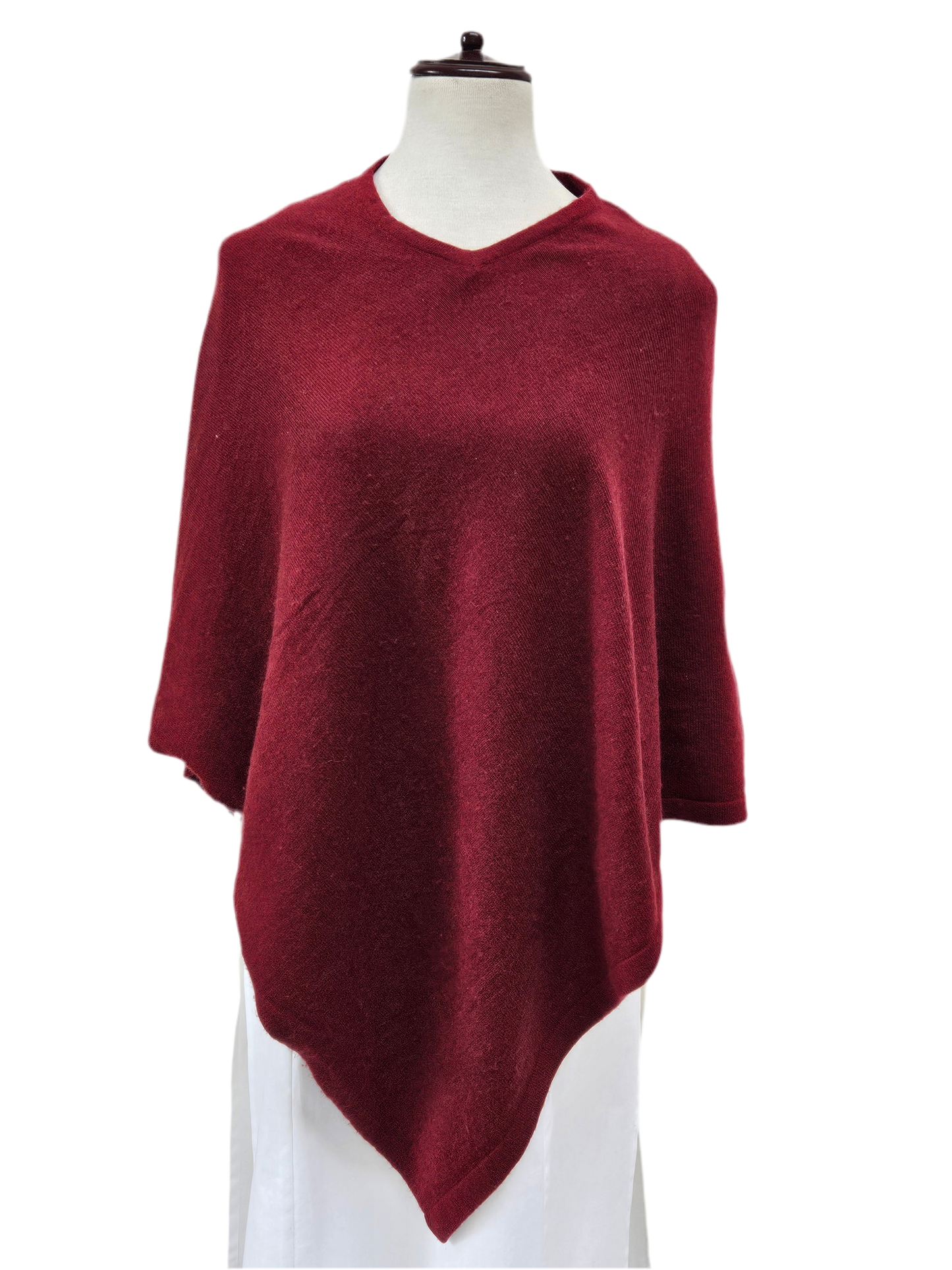 Poncho de lana. Vino