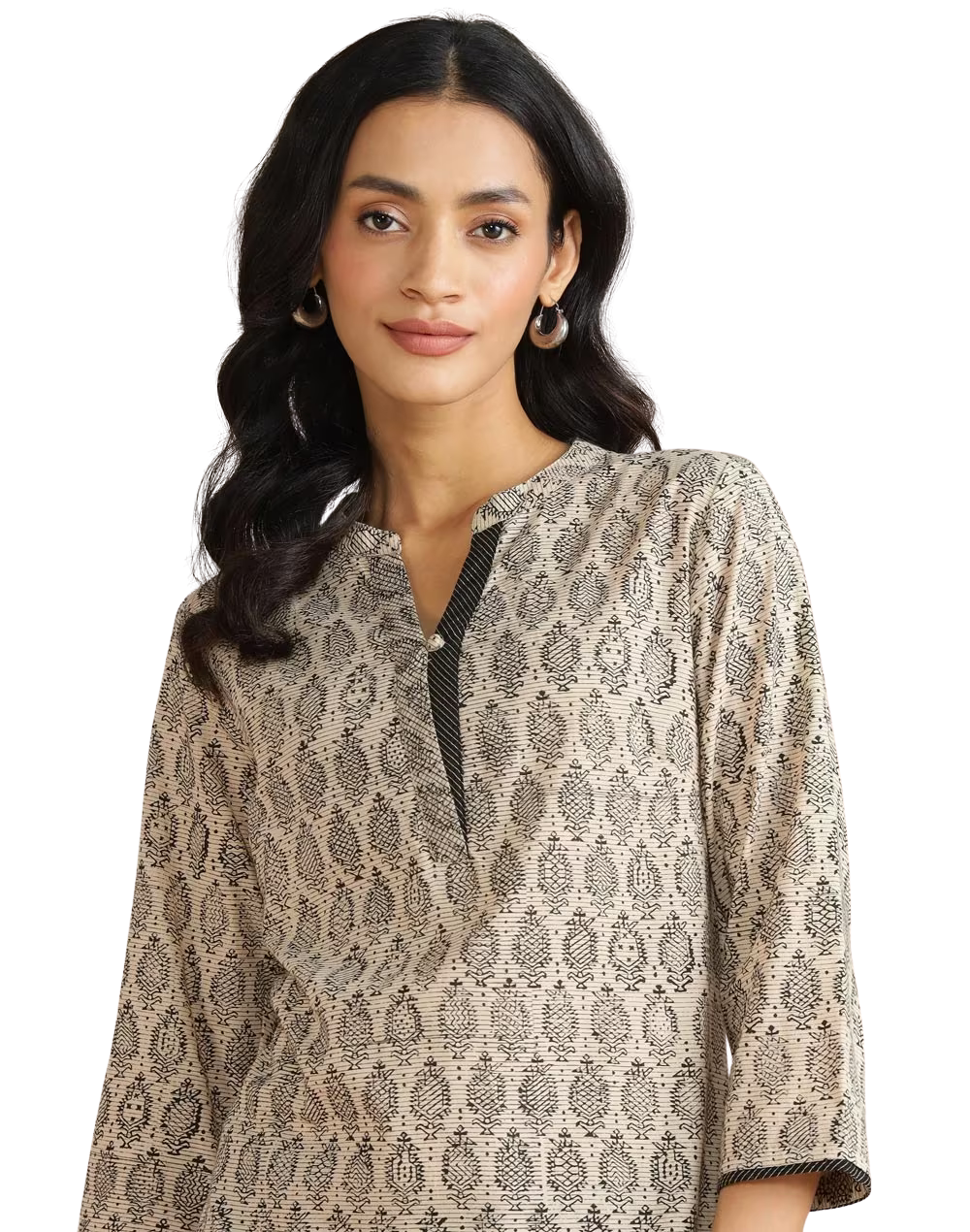 Kurta corta estampada. Beige y negro