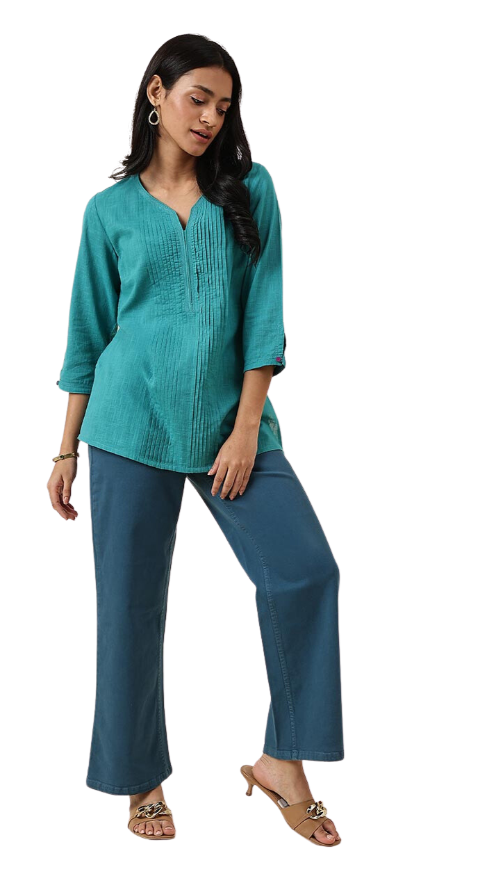 Kurta corta con pliegues. Turquesa