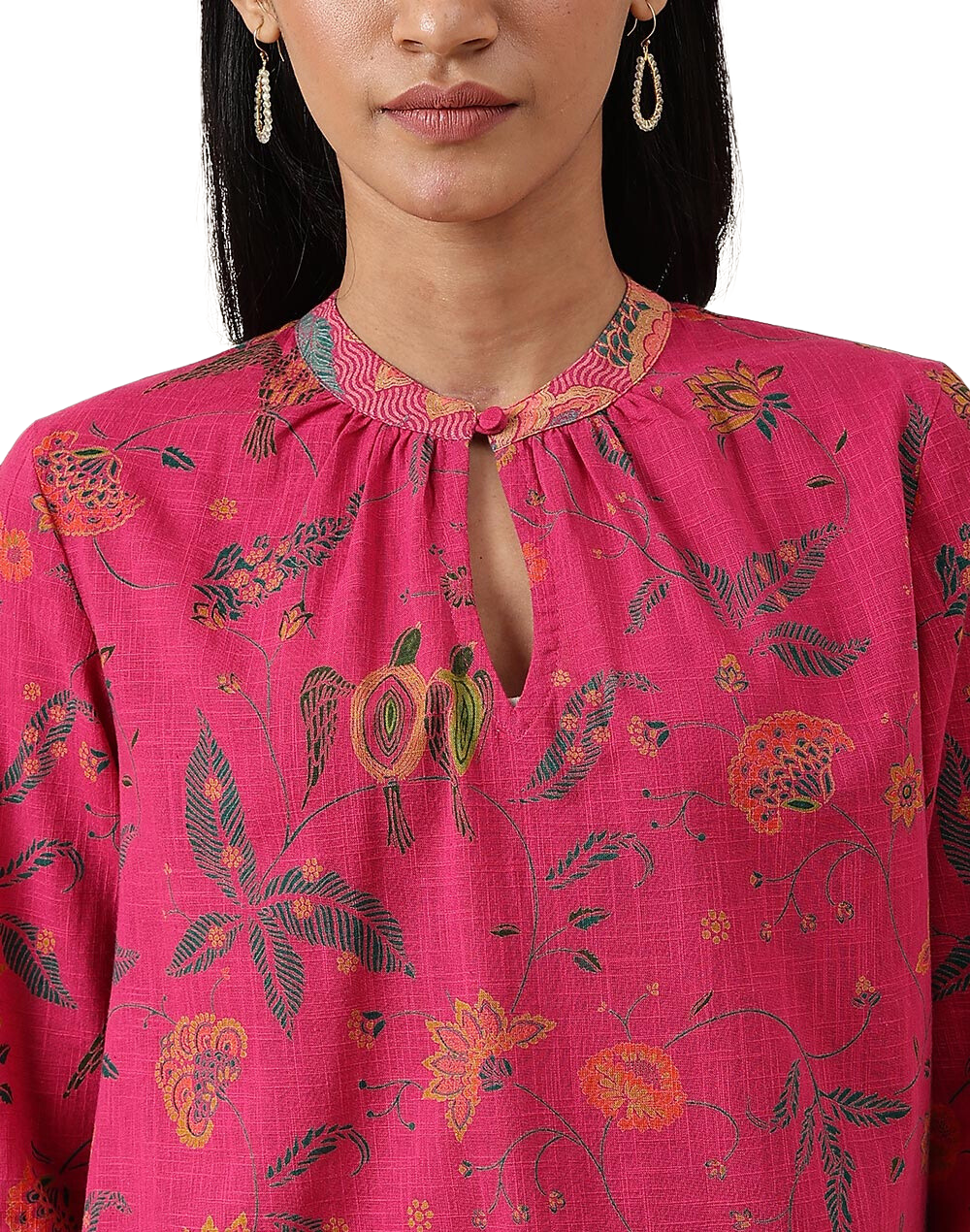 Kurta corta. Corte amplio. Estampada. Magenta