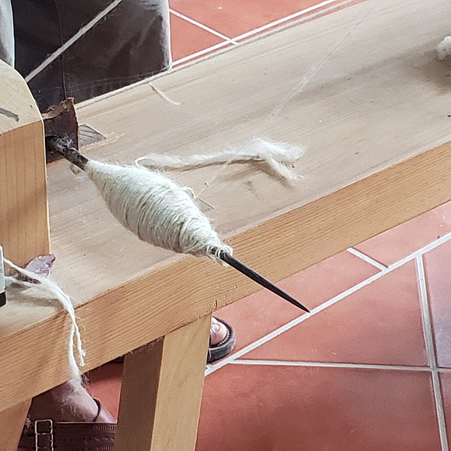 Lana hilada en telar.