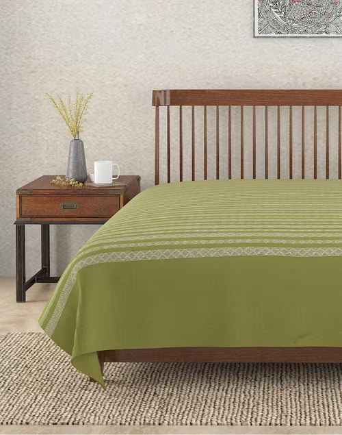 Colcha tejida en telar. Azar verde