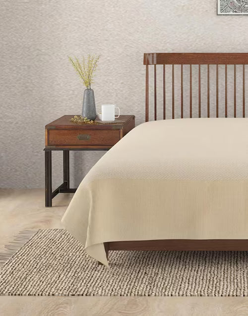 Colcha tejida en telar. Azig beige