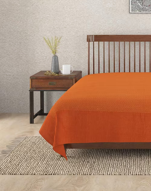 Colcha tejida en telar. Azig óxido