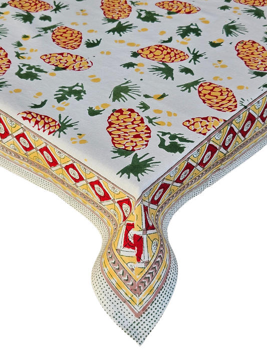 Mantel navideño RECTANGULAR Piñas en blanco. Estampado a mano