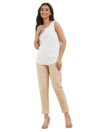 Blusa sin mangas appliqué. Blanca
